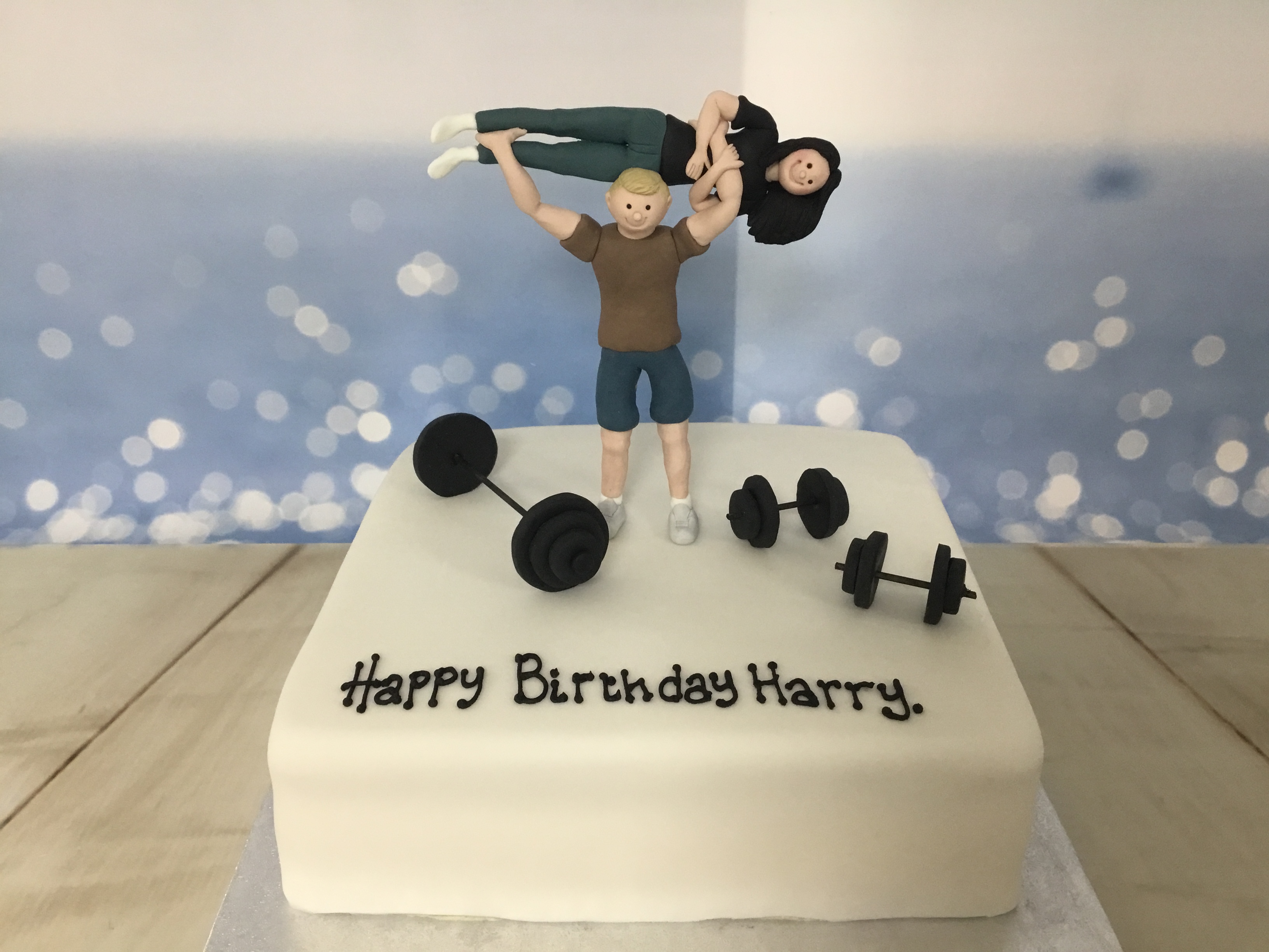 Baker's 13 - A fitness-gym themed cake for a very active young lady  celebrating her hatch day. Design specs had to include 3D elements from her  usual activities, like the treadmill, skipping